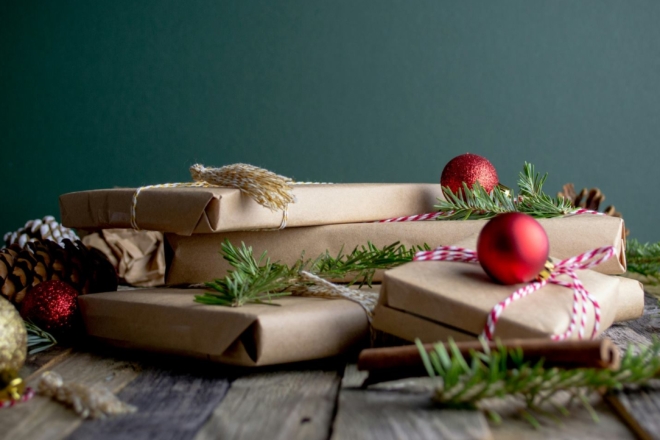 Wrapped gifts against a green background
